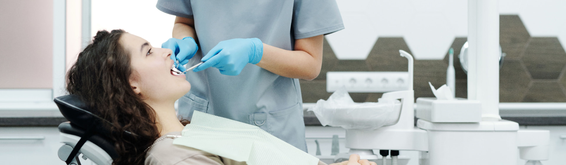 Patient receiving a professional dental cleaning