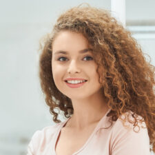 Beautiful girl smiling confidently.